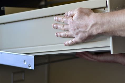 metal file cabinet drawer not opening